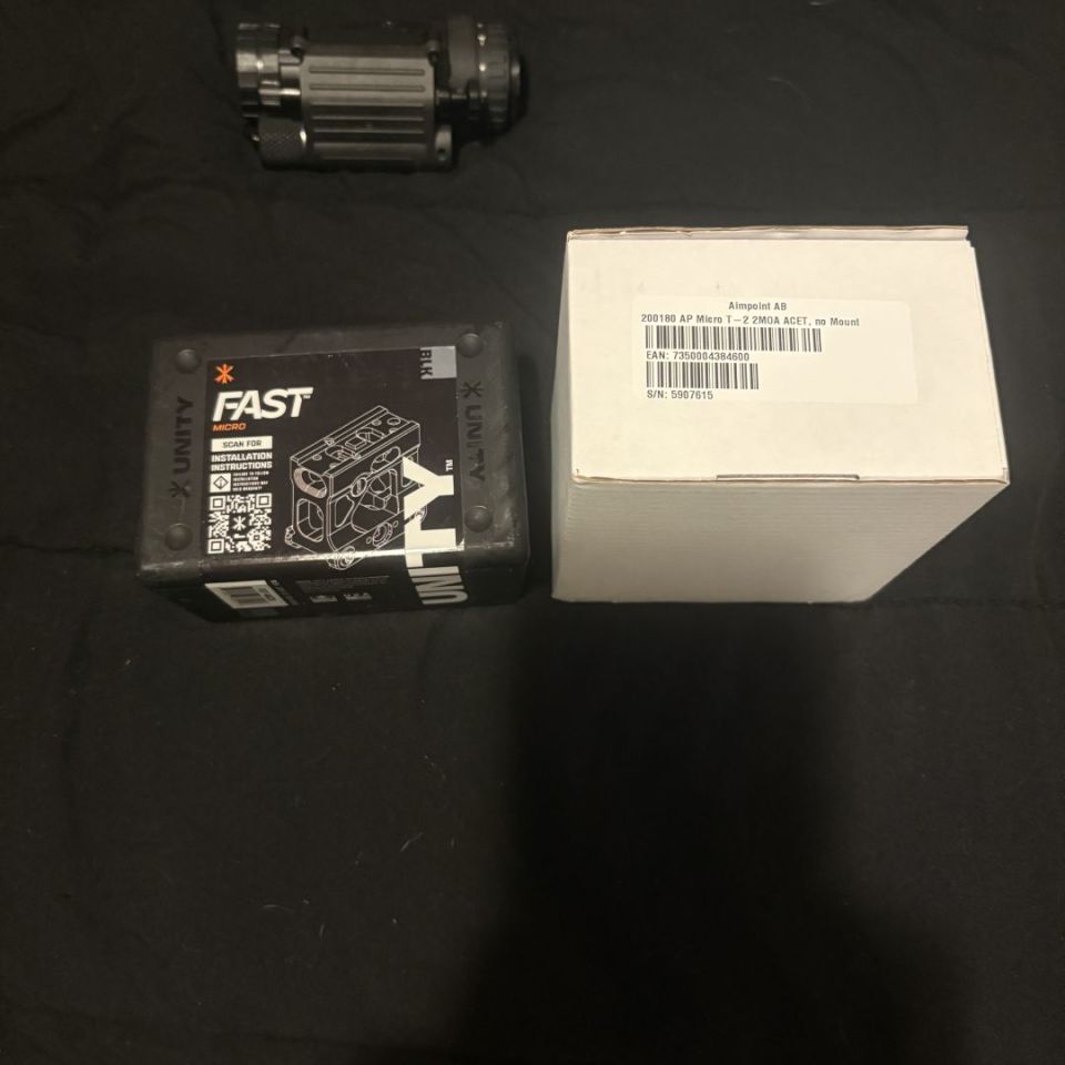 Image 2 - New and used optics!