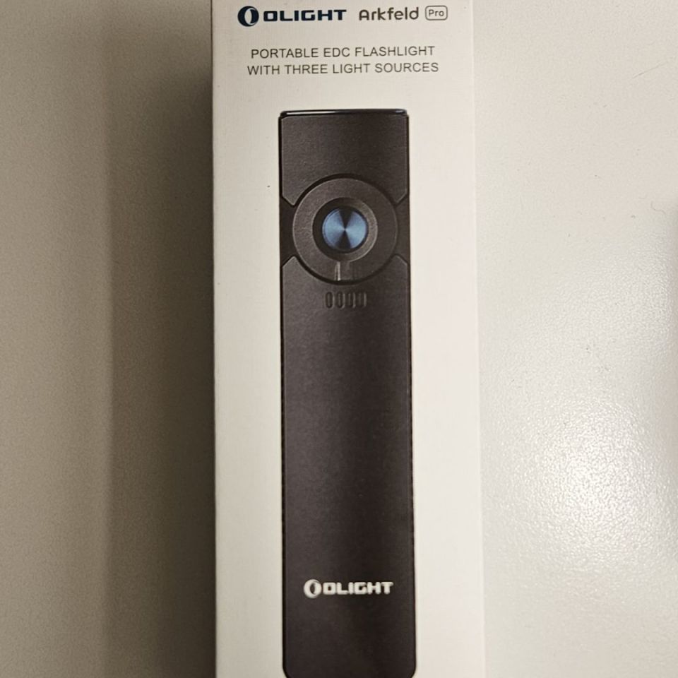 Image 3 - Olight Arkfeld Pro. New In Box