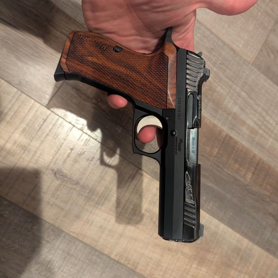 Image 1 - Sig p210 carry