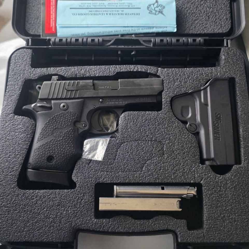 Image 1 - Sig P938 9mm