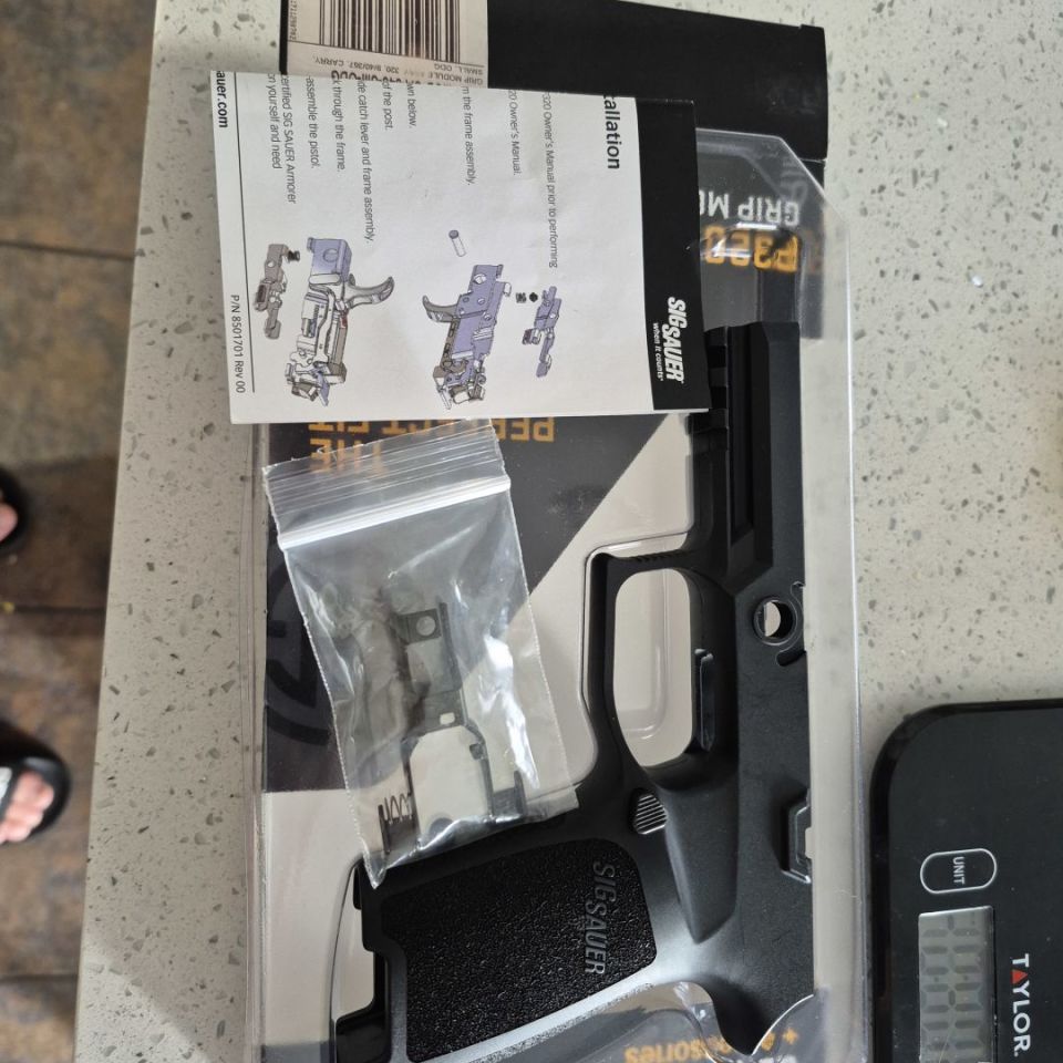 Image 1 - Sig p320 grip module