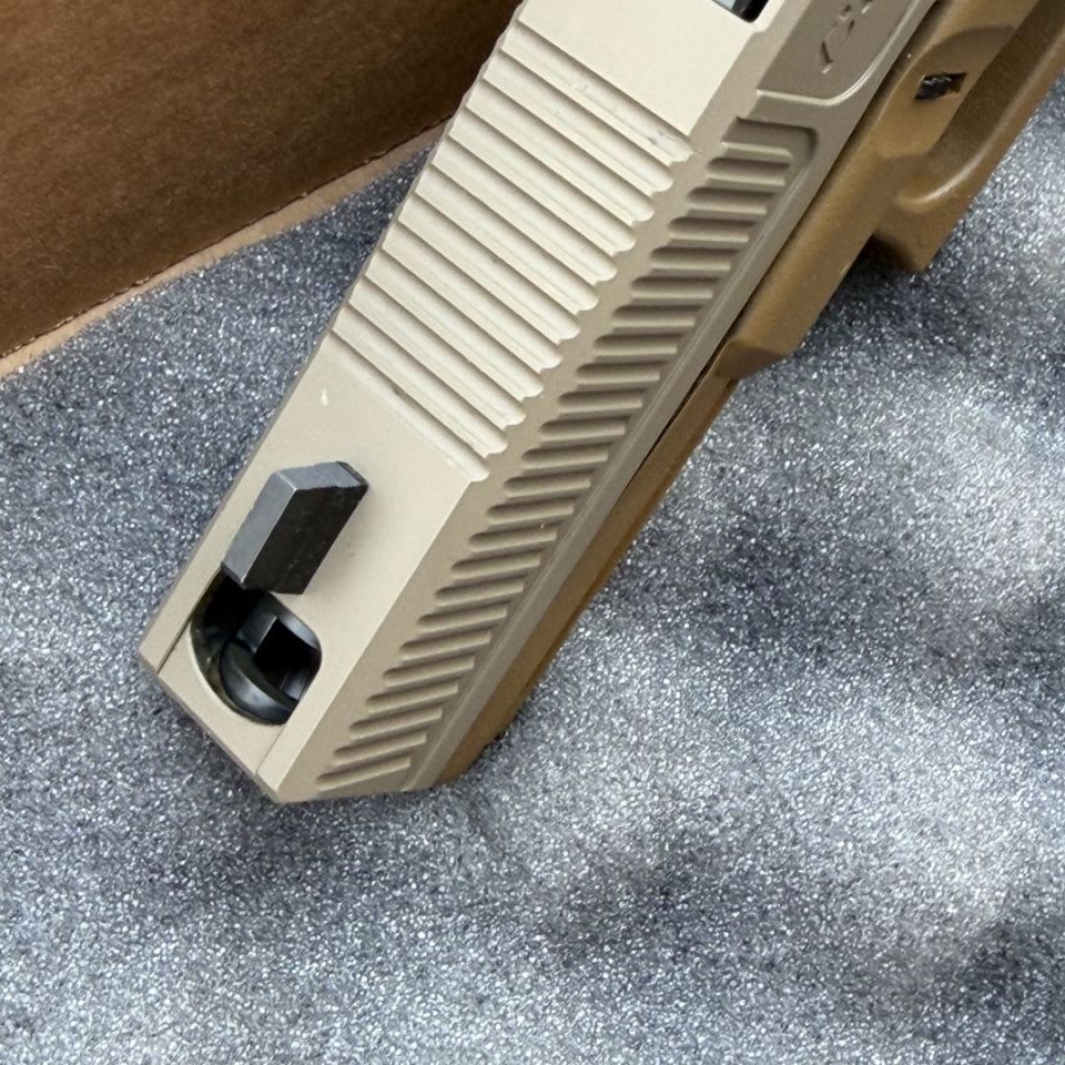 Image 2 - Congo Glock comped 