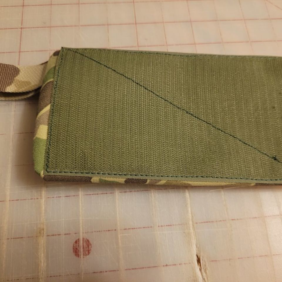 Image 3 - Many little hook pouches!