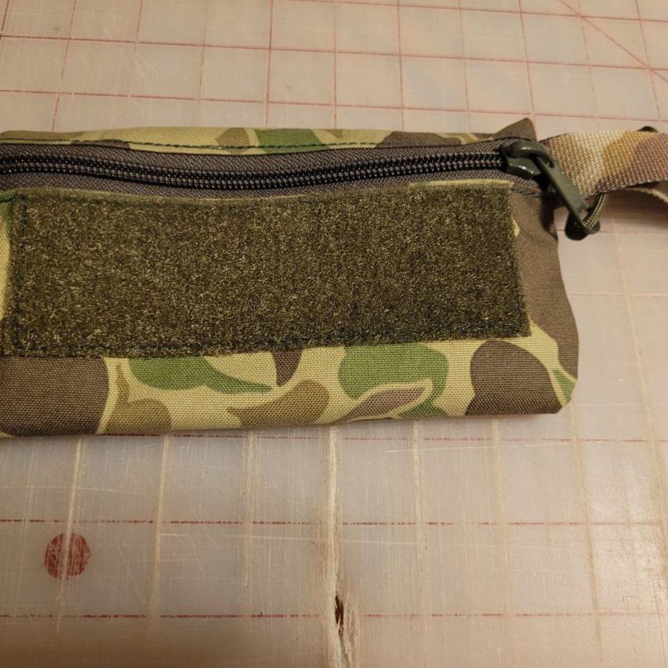 Image 4 - Many little hook pouches!