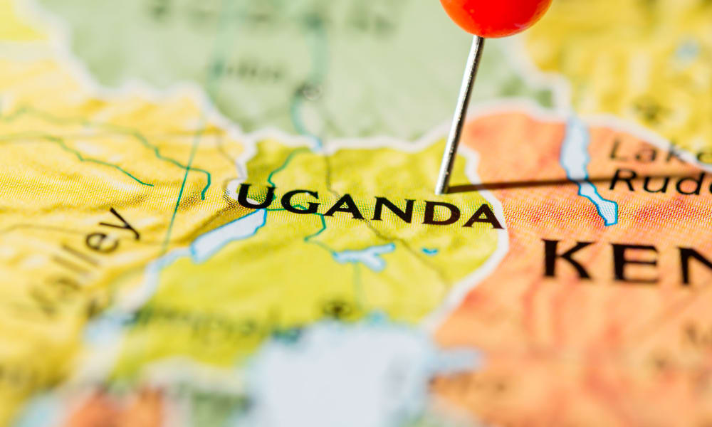 A map with a pin in Uganda