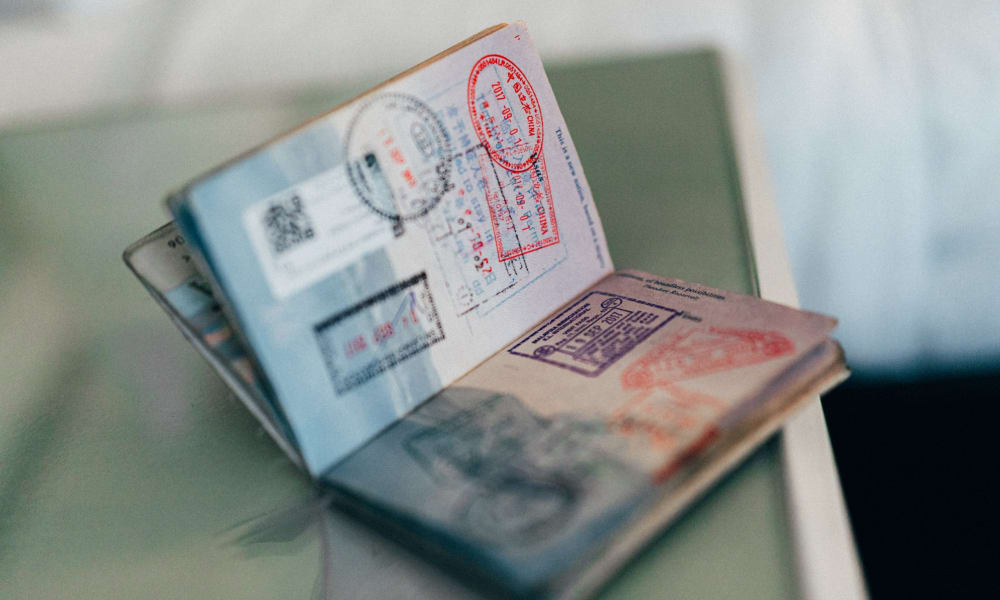 Passport with multiple visa entry stamps