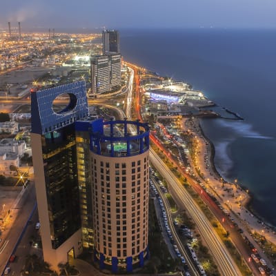 An aerial view over the city of Jedda by night