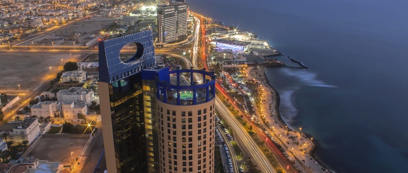 An aerial view over the city of Jedda by night