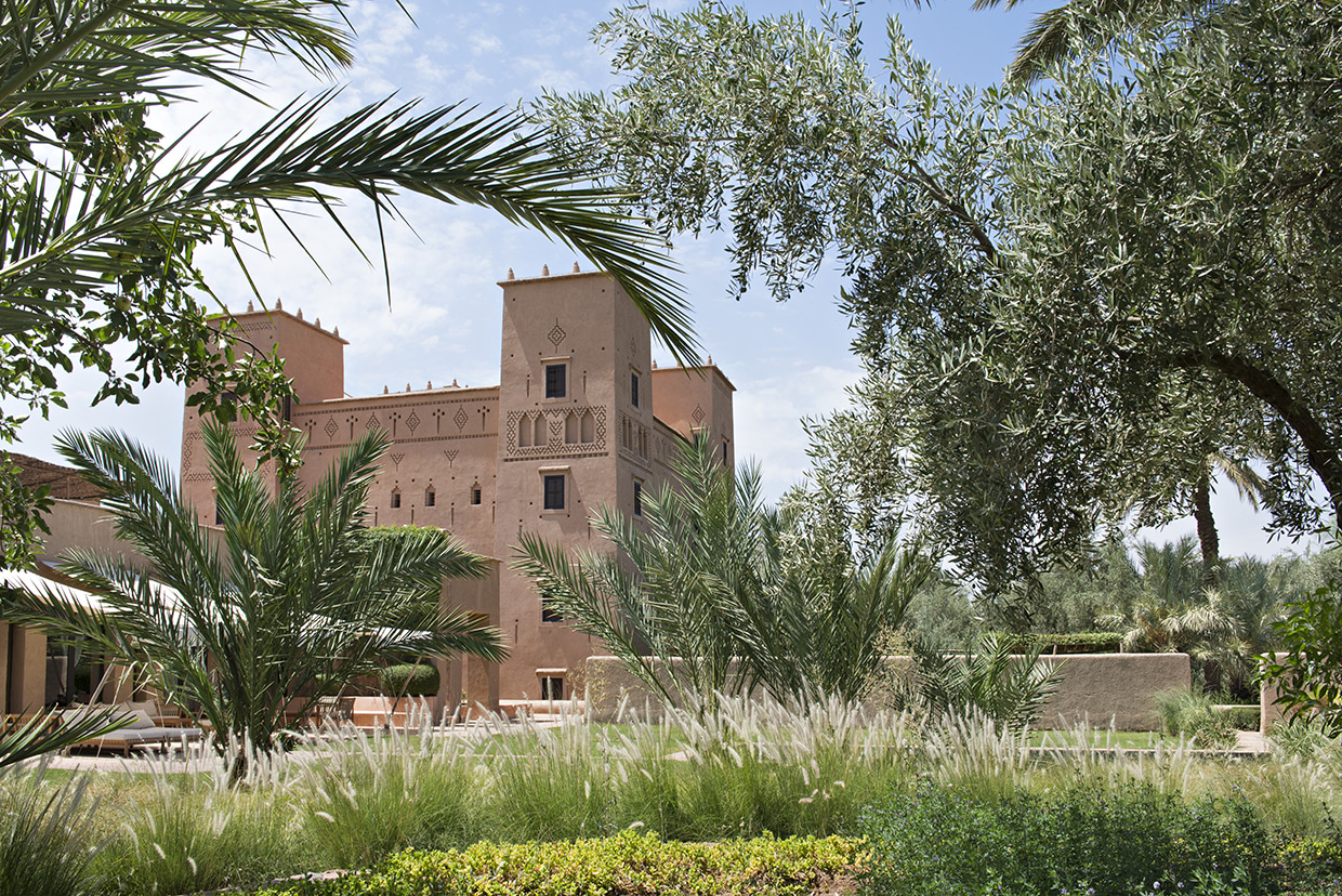 Hotel und Gartenansicht