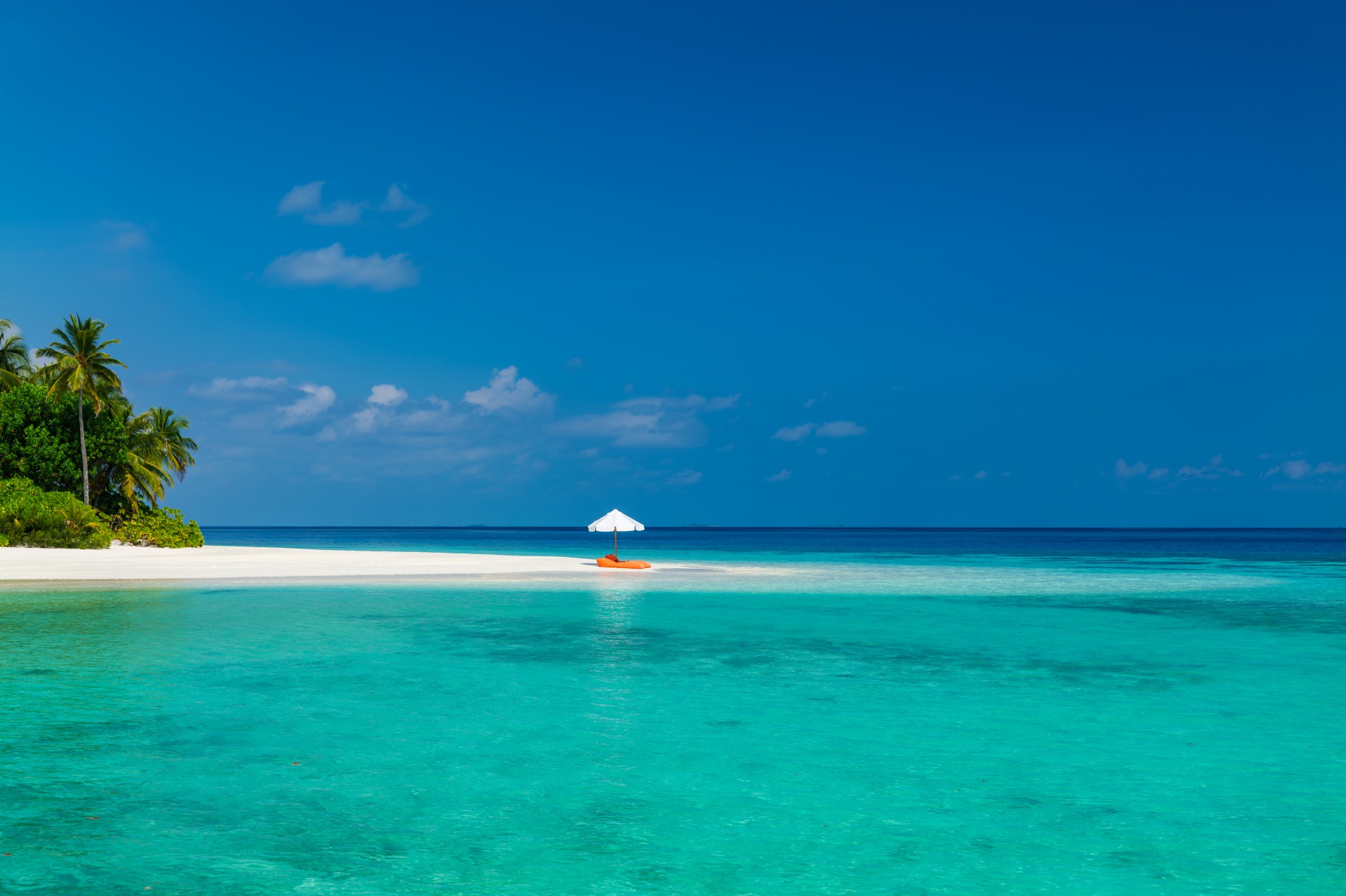 Sonnenbaden am Strand von Mirihi Island