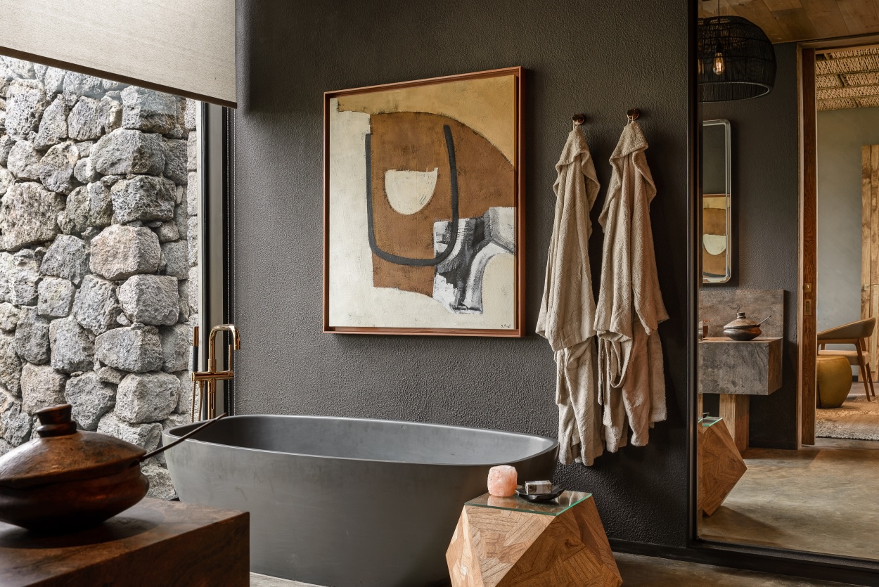 Badezimmer mit Badewanne im Singita Kataza House