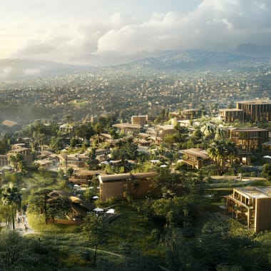 Eine moderne Gemeinschaft am Hügel mit mehreren zeitgenössischen Gebäuden umgeben von üppigem Grün unter wolkigem Himmel.