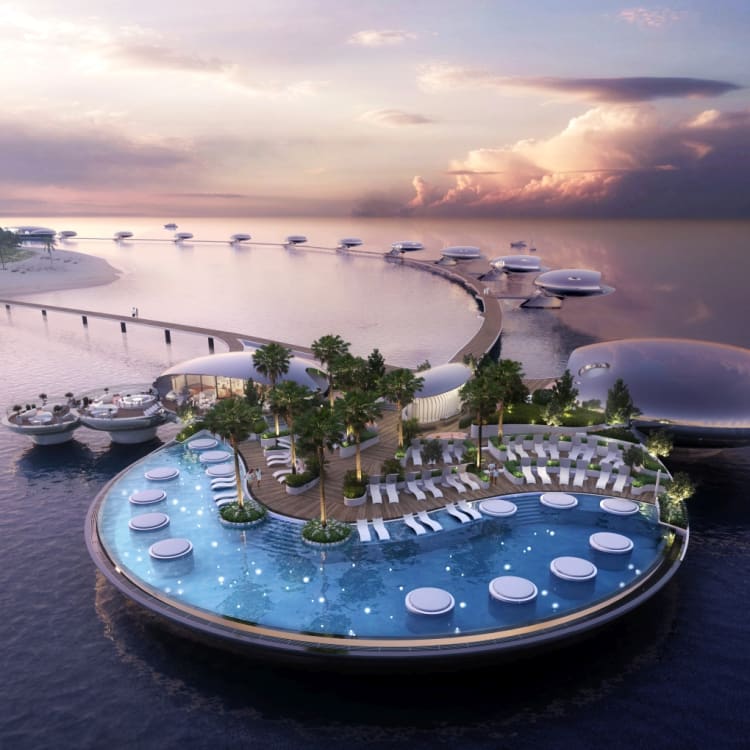 Ein luxuriöses Resort als schwebende Insel mit einem großen Pool, umgeben von Palmen und moderner Architektur, auf einem ruhigen Meer bei Sonnenuntergang.