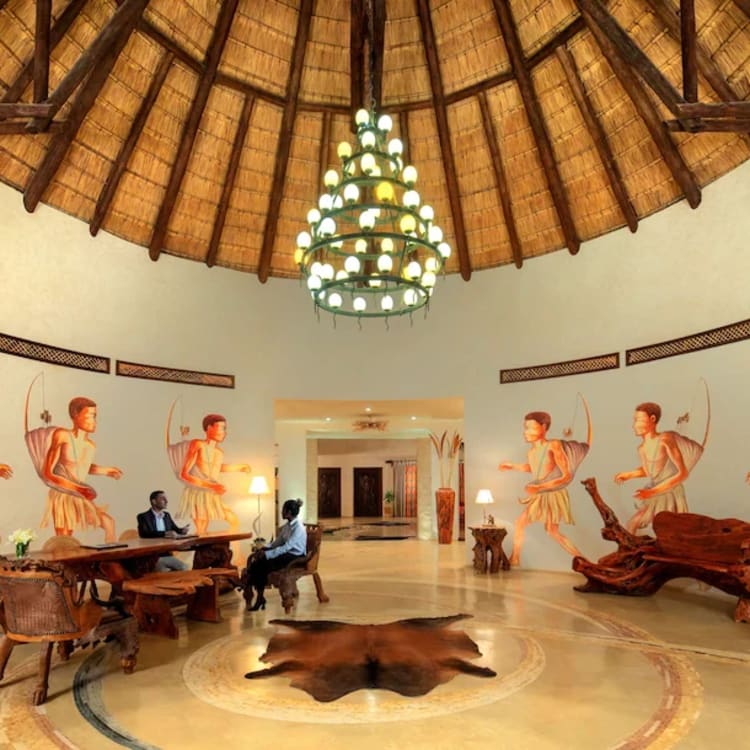 A reception under a dome with angel wall paintings