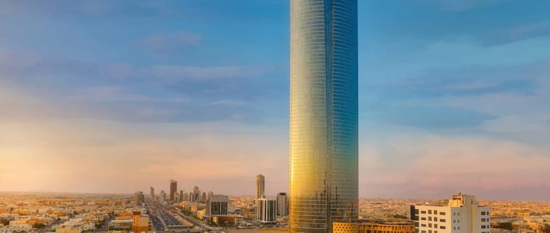 A outside view of the Marriott Burj Rafal in Riyadh by sunset or sunrise