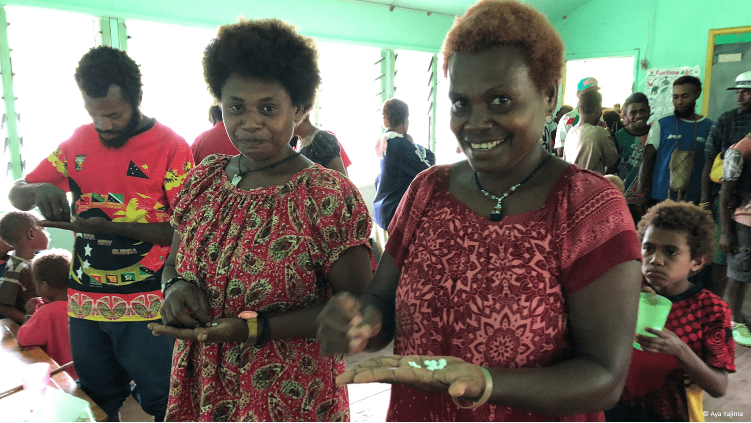 Women receiving medicine