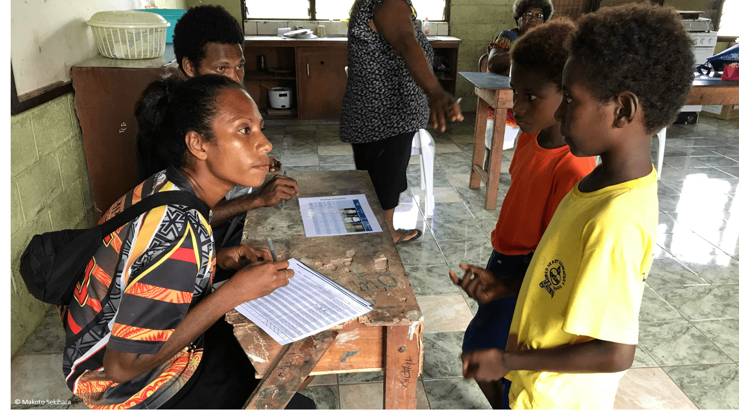 Kids speaking with physician