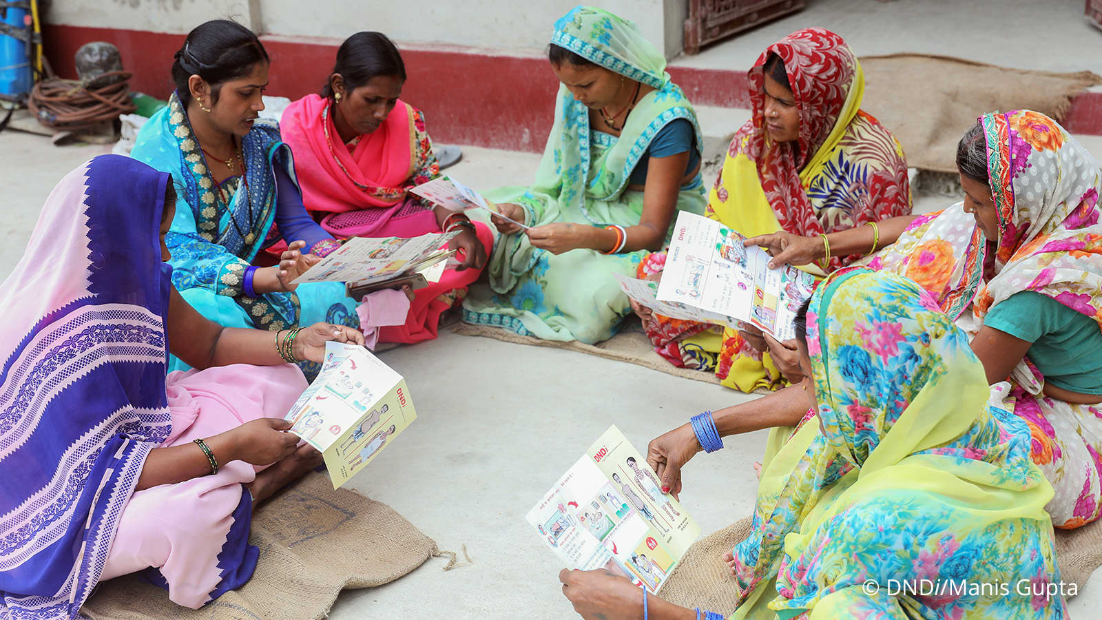 Women reading provided dndi content