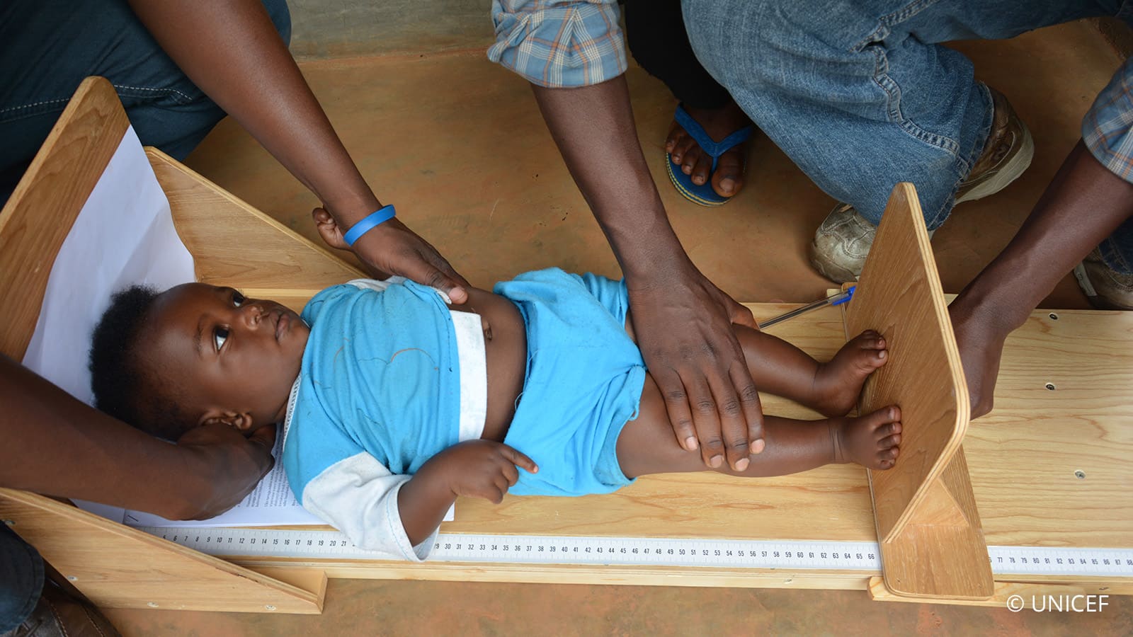 Child being measured