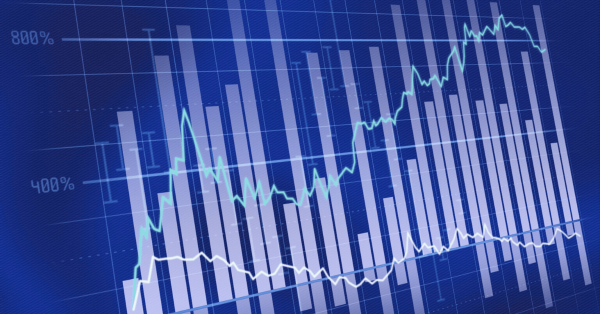 Image of a computer monitor with bar charts overlaying line graphs