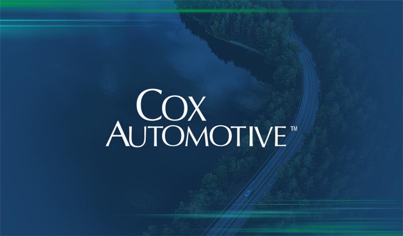 A blue image with a logo of Qlik customer, Cox Automotive