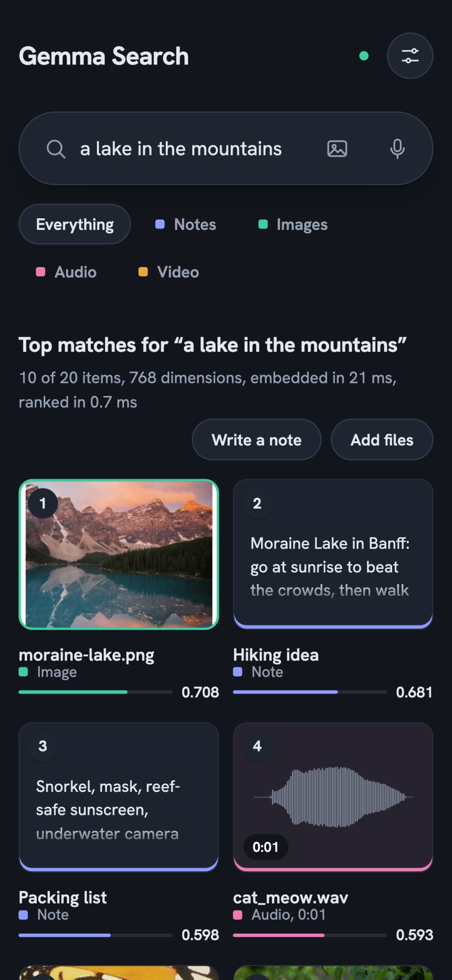 The app on a phone in dark mode, with "a lake in the mountains" returning the Moraine Lake photo first and a hiking note second