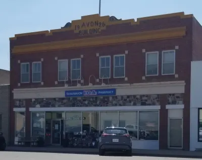 13. Avon Building (I.D.A. Pharmacy) 353 Centre Street