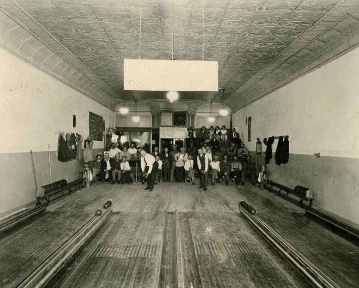 **March 1928**: E. Rousch opens recreation bowling alley, featuring 4 alleys. Rousch was a national trap shooter. **May 1929**: Art Johnson of Gull Lake purchases E.M. Rousch Bowling Alley. **August 1930**: Johnson Bowling Alley closes due to financial difficulties - lanes and equipment are purchased and moved to Gull Lake. **November 1930**: Old bowling alley used for bake sales, auctions, etc.