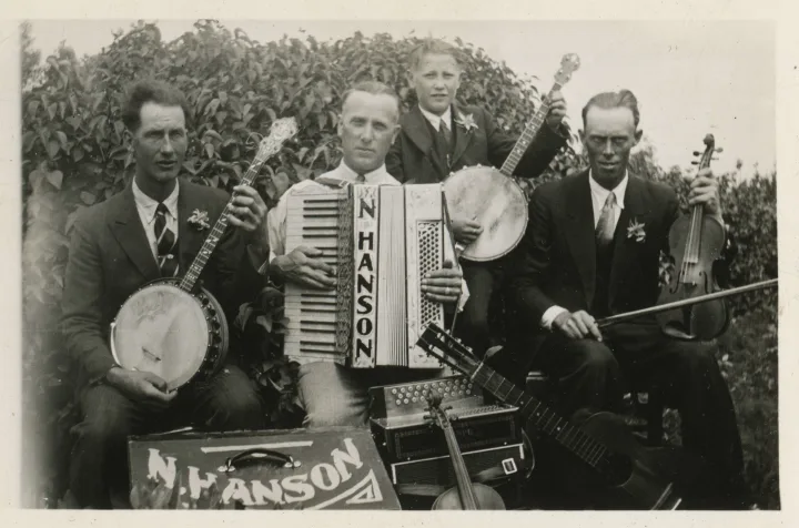 Nick Hanson's Orchestra 1934 (l-r) Paul Johnson, Nick Hanson, and John Aasen, and one boy, Woodrow Hanson