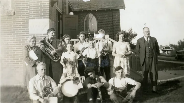 Possibly the Shaunavon Band Back Row (l-r) Winifred Jamieson, Mrs. May Stevens, unknown, Catherine Green, Gerry Green, Beryle Aldcorn, George Stevens Centre Row (l-r) Mu___ Jamieson, Milton Martin Front Row (l-r) Edgar Bowman, Bob Hocket, Don Hocket, Alex Jamieson