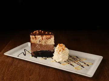 image of TRIPLE CHOCOLATE CELEBRATION CHEESECAKE