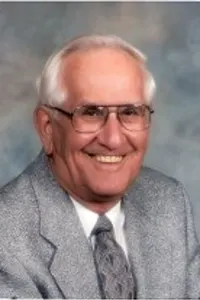 JOHN GYORKOS