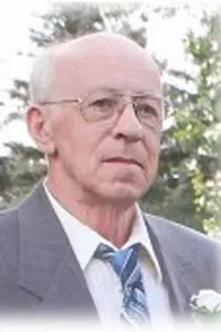 RAYMOND W. DURDA