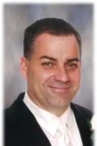 HENRY (HANK) DANIELS