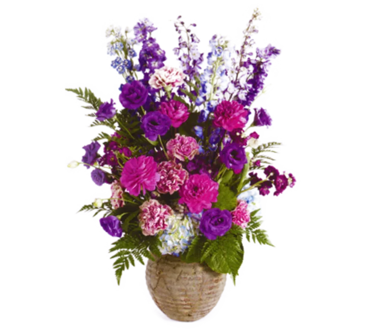 Lush Arrangement in Rustic Urn