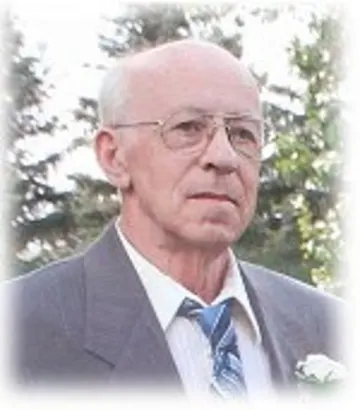 RAYMOND W. DURDA