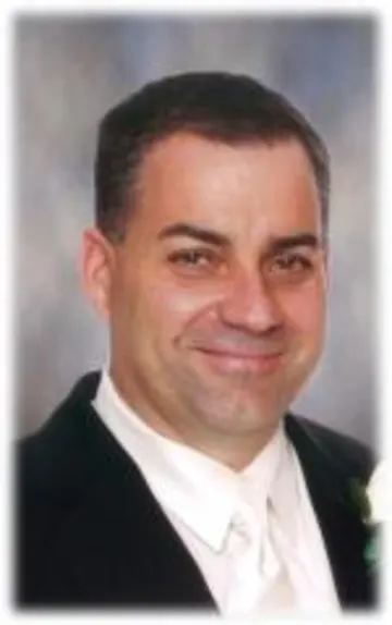 HENRY (HANK) DANIELS