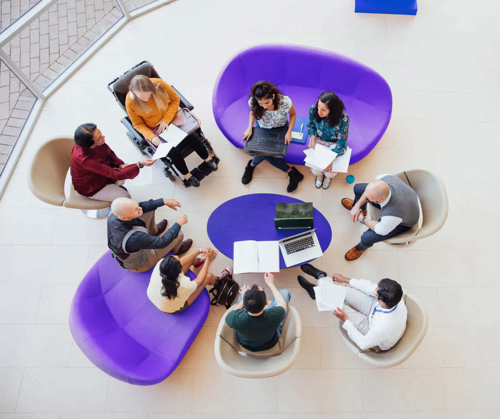 A group of people in a meeting