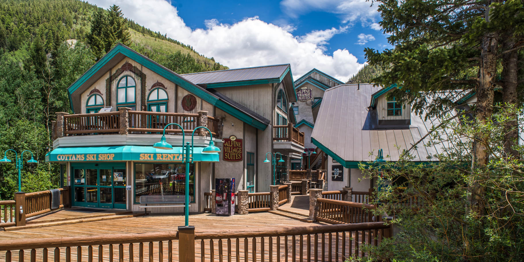 Alpine Village Suites summer exterior