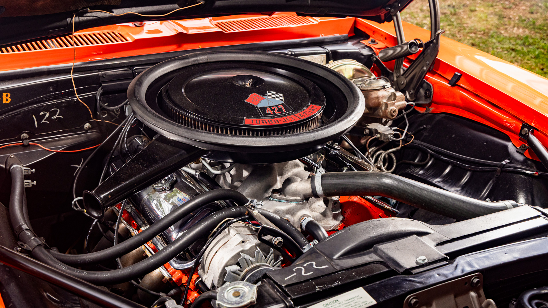 Rear view of the Hugger Orange 1969 big block Camaro
