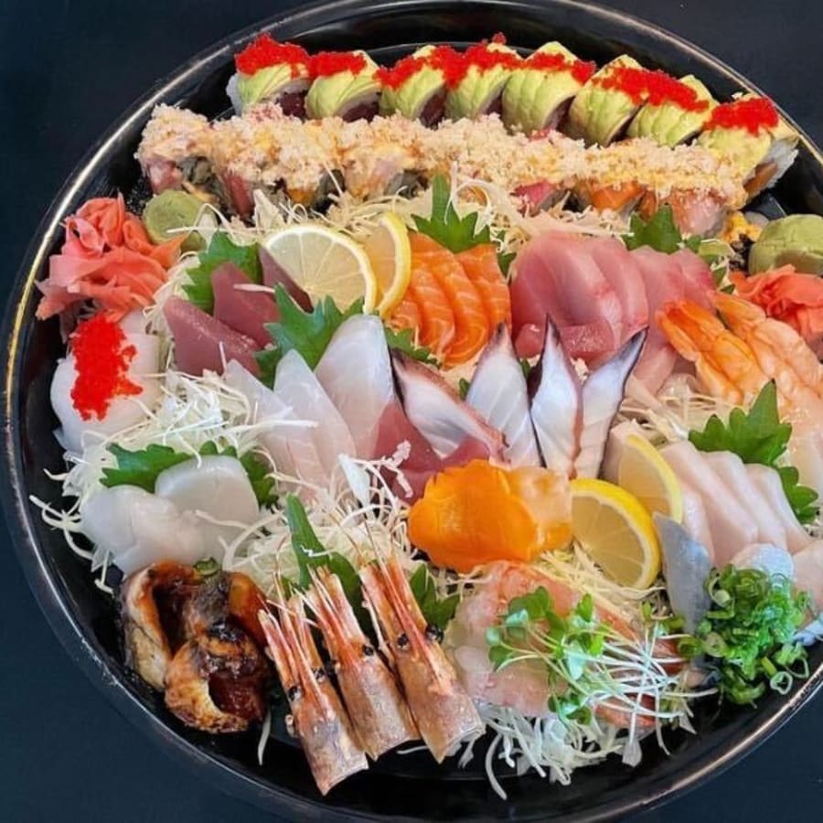 A large platter of fresh sashimi and nigiri