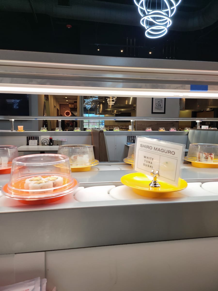 The sushi bar and conveyor belt seating at New Tokyo Hibachi