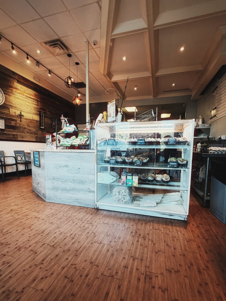 The dining room and pastry case at Bagel Cafe 21 in Richardson