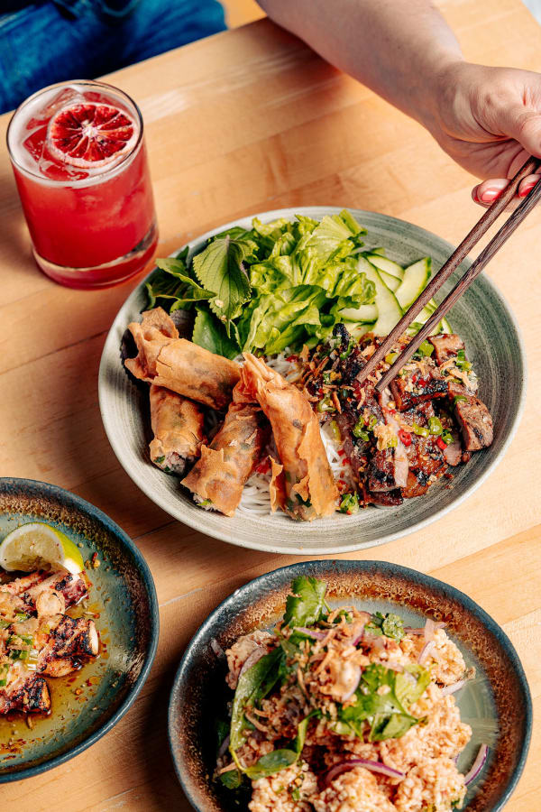 Bún chả with crispy spring rolls and a blood-orange cocktail at HaiSous
