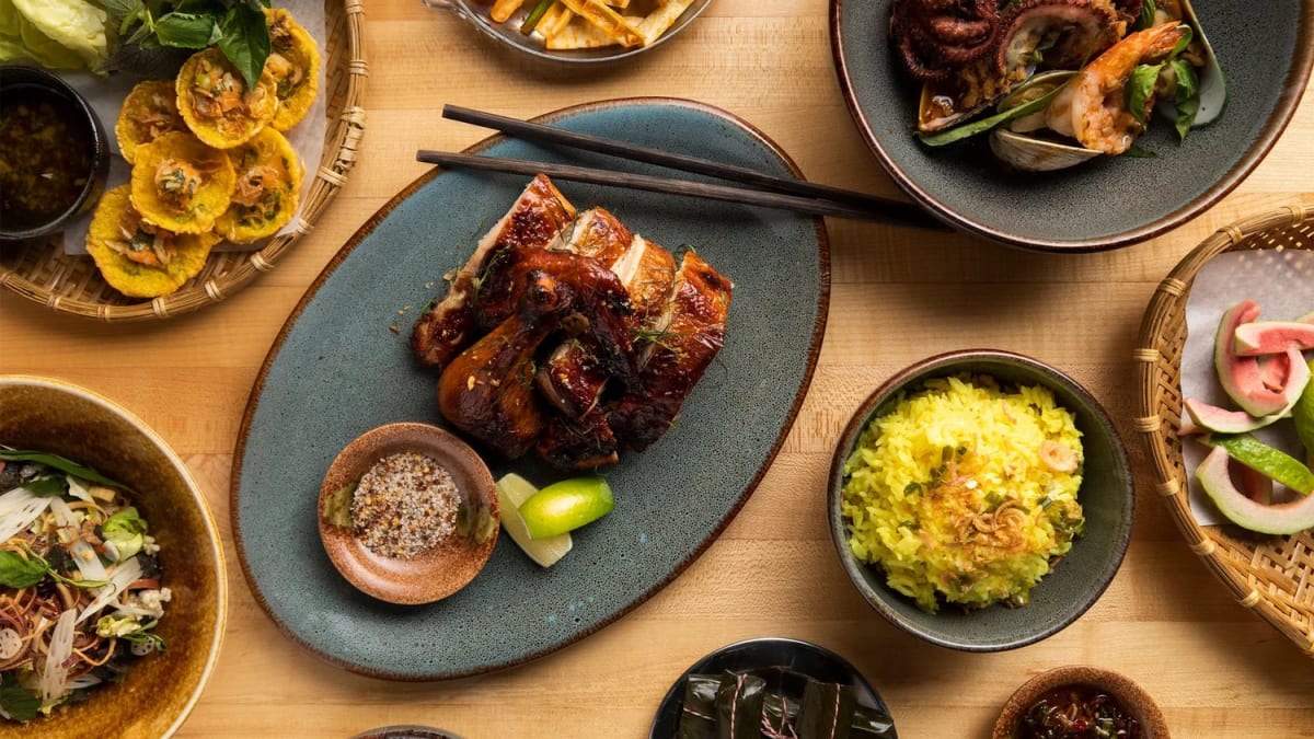 A family-style spread on the table at HaiSous