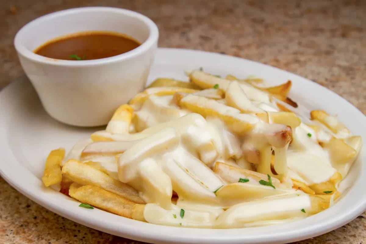 Loaded fries with melted cheese and gravy