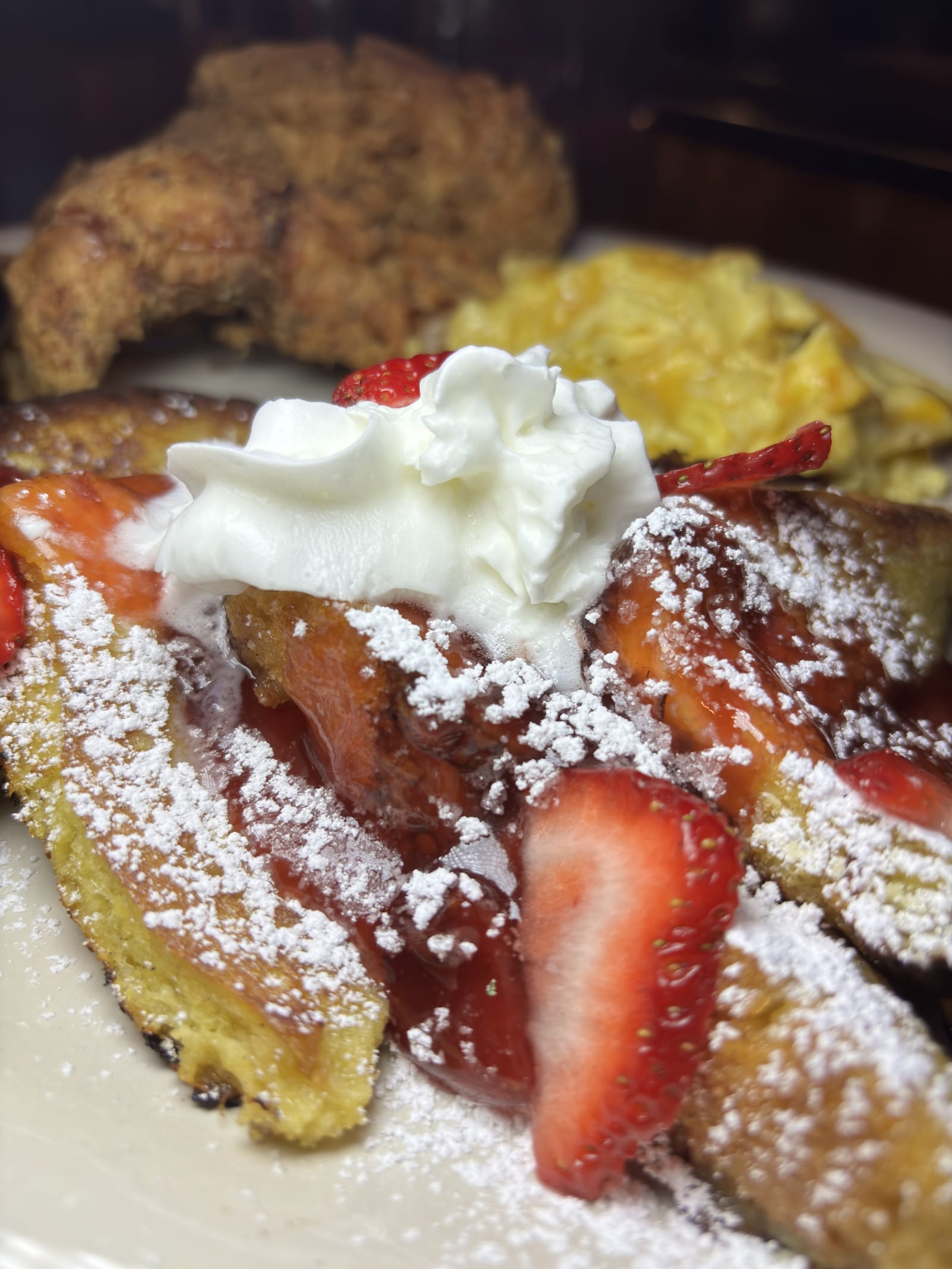 French toast with strawberries and powdered sugar
