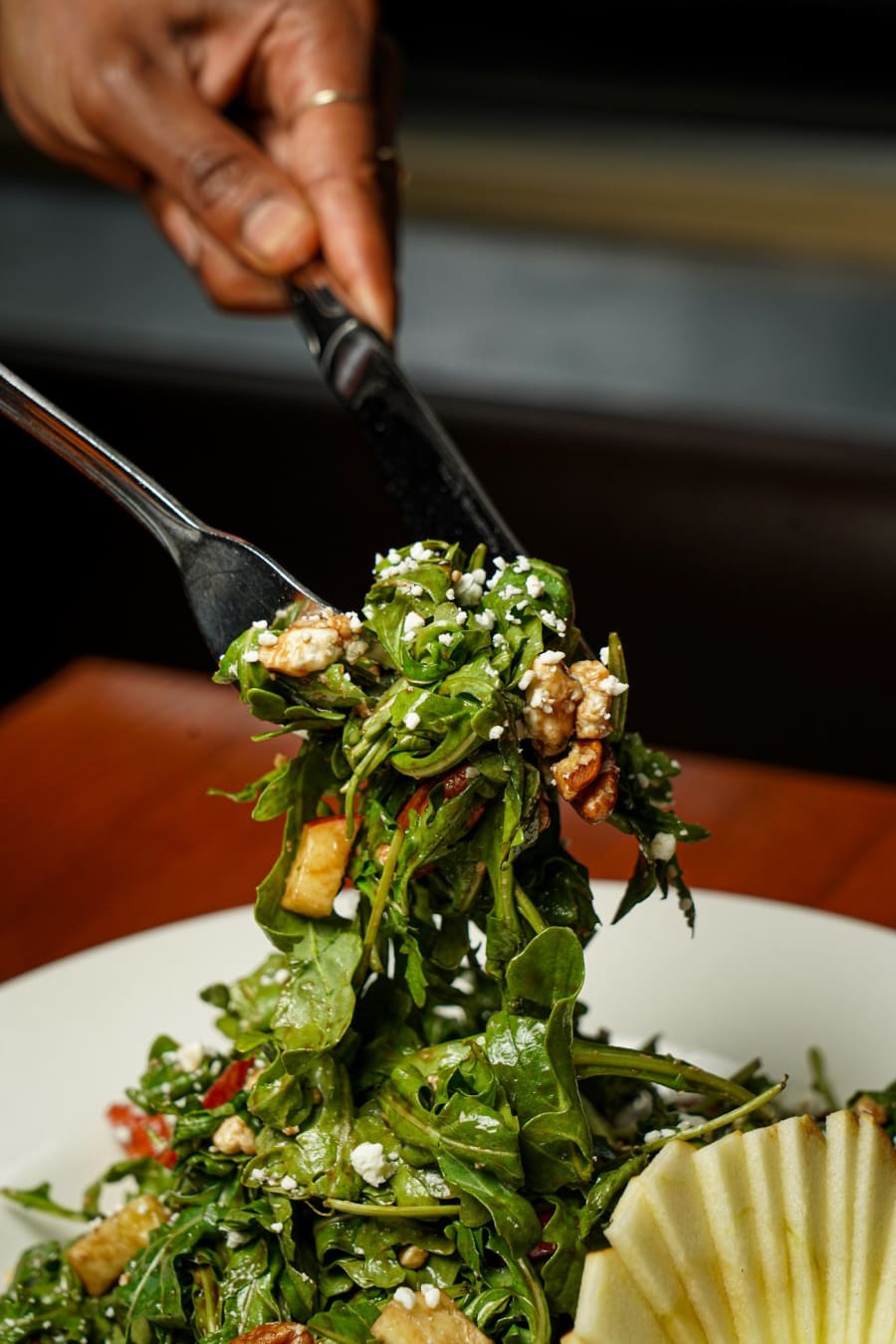 A forkful of arugula salad at Chocolat