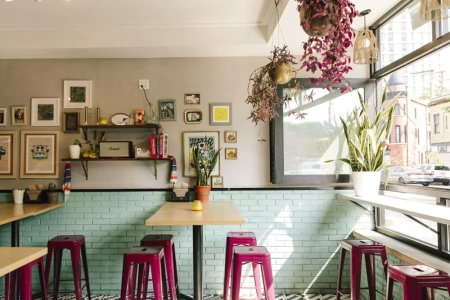 The teal-tiled dining room on Armitage