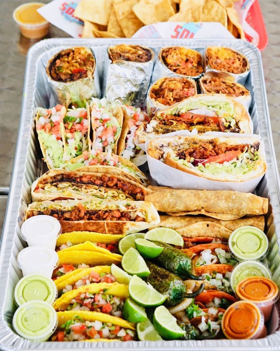 A large tray of Nuno's tacos, burritos and flautas for a group order